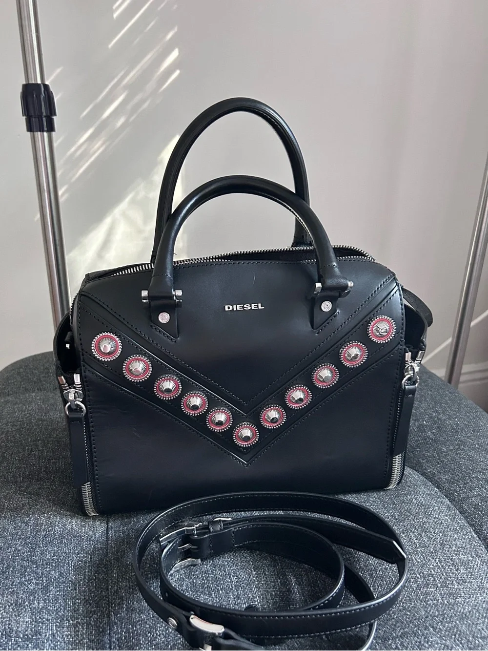 Diesel Black Leather Satchel with Red Grommet Accents in genuine leather